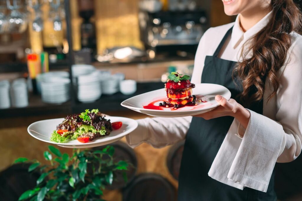 Woman Uses Food Handlers Cheat Sheet To Know Food Safety While Serving Food