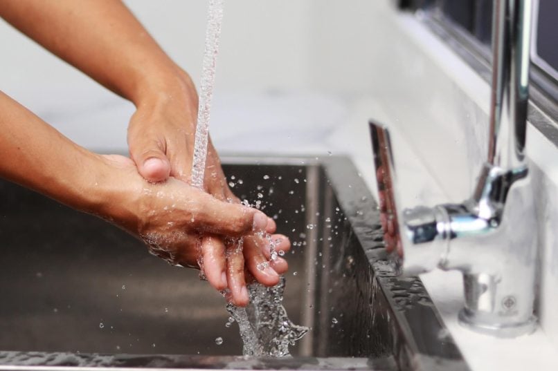Waiter Double Washing Hands Because Of Proper Texas Food Handler Safety Training
