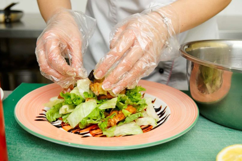 Food Handling Wearing Gloves Making A Salad